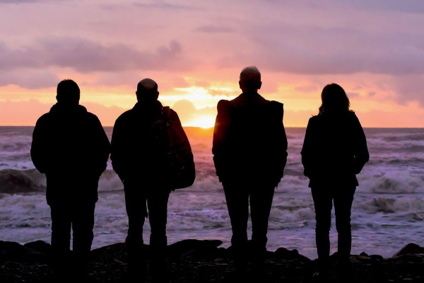 The Bats looking into sunset