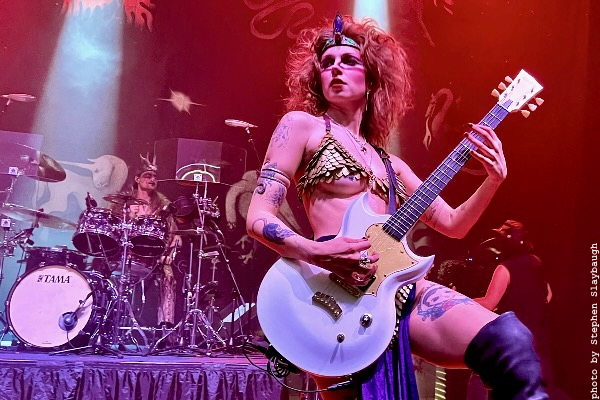 The Rat Queen playing guitar
